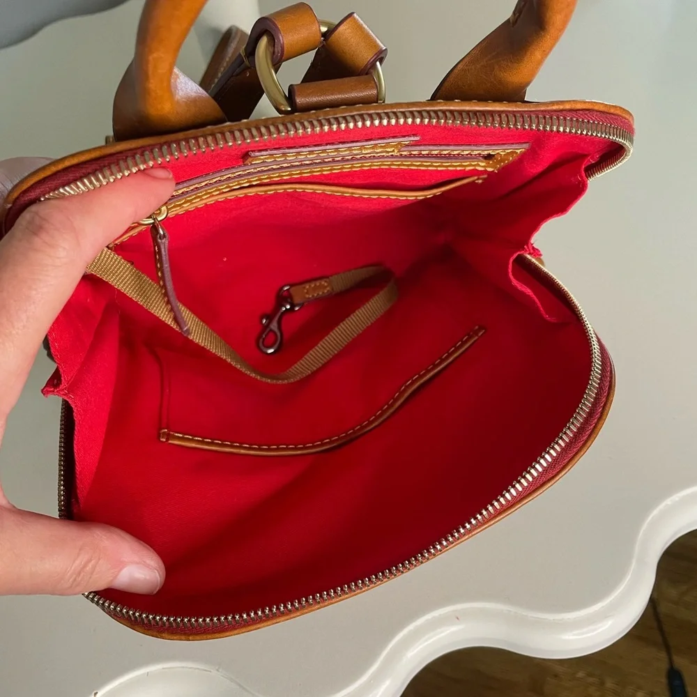Dooney and Bourke Florentine leather small backpack.